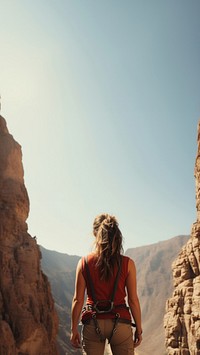 Photography of climber woman at artificial cliff.  