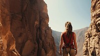 Photography of climber woman at artificial cliff.  