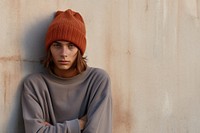 Beanie sweater brown contemplation. AI generated Image by rawpixel.