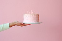 People hand holding minimal cute birthday cake dessert food anniversary. AI generated Image by rawpixel.