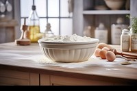 Baking flour and eggs, kitchen table photo. .