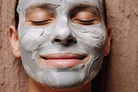 Woman getting a mud facial mask. AI generated Image by rawpixel.