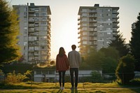 Young couple architecture building standing. 