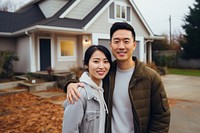 Asian couple architecture standing building. 