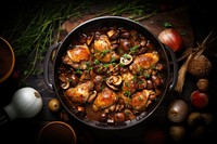 French Coq Au Vin Chicken table food meat. 