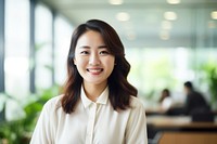 Happy asian woman portrait smiling office. 