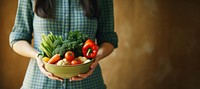 Woman holding vegetables basket adult woman food. 