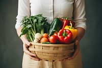 Woman holding vegetables basket adult plant woman. 