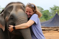 Hugging asian baby elephant wildlife outdoors portrait. 