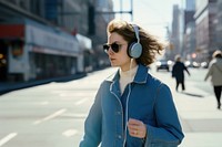 Woman earphone headphones sunglasses.