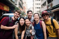 Happy chinese backpackers portrait street selfie. 