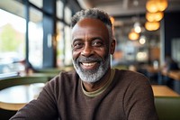 Senior man smiling African man portrait laughing. AI generated Image by rawpixel.