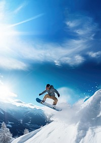 A photo of the man jumping with snowboard from the hill, snow background.  