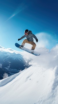 A photo of the man jumping with snowboard from the hill, snow background.  