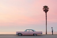 Pink retro car on a beach photo.