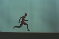 African American sprinter running jogging motion. 