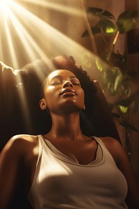 Relaxing massage African american woman light portrait. 