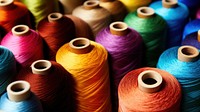 photo of colorful threads.  