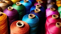 photo of colorful threads.  