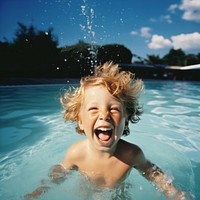 Kid swimming laughing portrait. 