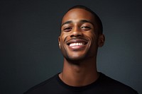 Black men smile portrait laughing. 