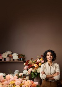 photo of a smiling florist looking at the camera studio shot isolated on a solid background.  