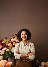 photo of a smiling florist looking at the camera studio shot isolated on a solid background.  