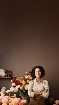 photo of a smiling florist looking at the camera studio shot isolated on a solid background.  