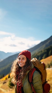 Photo of happy smiling woman hiking in mountains.  