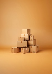 Photo of stacked moving boxes, isolated on beige background.  