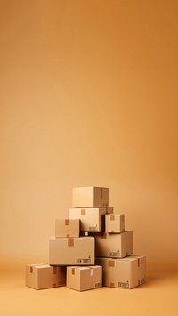 Photo of stacked moving boxes, isolated on beige background.  