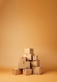 Photo of stacked moving boxes, isolated on beige background.  