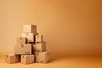 Photo of stacked moving boxes, isolated on beige background.  