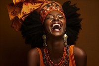 African dress laughing necklace celebration. 