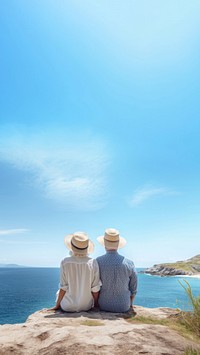 Traveler senior couple look at the sea.  