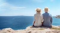 Traveler senior couple look at the sea.  