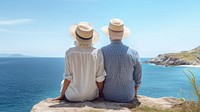 Traveler senior couple look at the sea.  