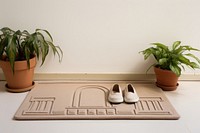 Beige house mat shoe footwear architecture.