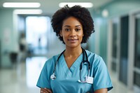 Female African American doctor hospital standing portrait. 