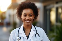 Female African American doctor stethoscope portrait smiling. 