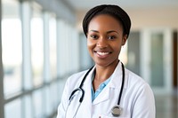 Female African American doctor stethoscope portrait smiling. 