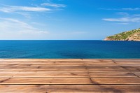 Wooden table wood sky sea. 