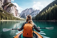 Young woman kayaking recreation lifejacket mountain. 