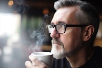 Man sipping coffee glasses smoking adult. AI generated Image by rawpixel.