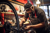 Technician repairing a bicycle vehicle sports wheel. 