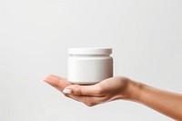 Cosmetics jar mockup Hand hand. 