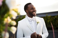 White wedding suit smiling adult smile. 