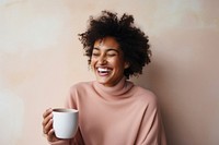 Woman drinking tea laughing smiling smile. 