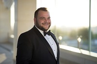 Wedding tuxedo photography portrait smiling. 