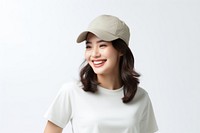 Woman cap t-shirt smiling. 